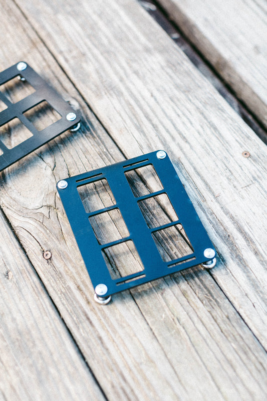 Homestead Defense 6-Pack MOLLE panel, laser-cut and designed for compact gear storage on vehicles, tractors, and shop walls.