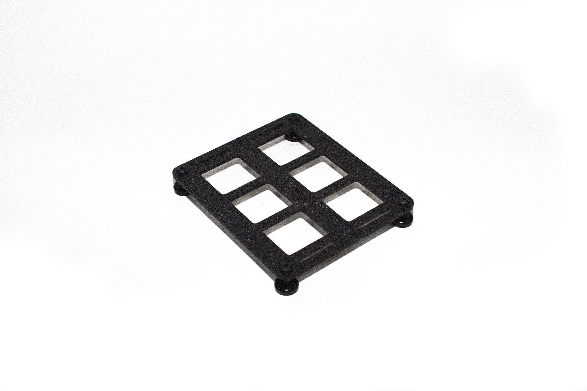 6-slot ABS MOLLE panel equipped with magnetic mounting feet for attaching to metal surfaces.